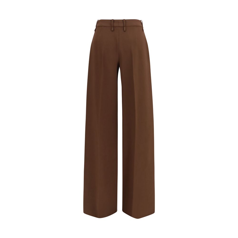 Elevate your wardrobe with Ermanno Scervino's Brown Viscose Flared Pants, a masterpiece of luxury craftsmanship that embodies sophistication and timeless elegance.