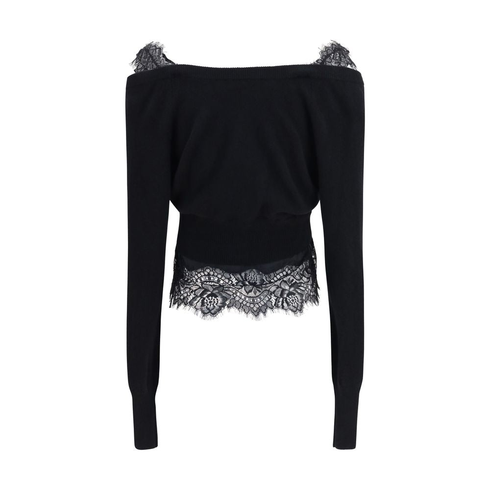 Elevate your elegance with the Ermanno Scervino Black Cashmere Cardigan, a masterpiece of layered design and luxurious cashmere, perfect for sophisticated occasions.