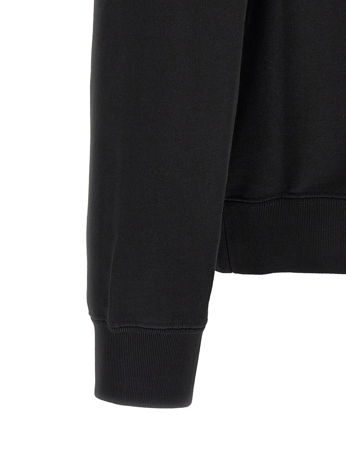 Elevate your wardrobe with the Canada Goose Black Cotton Sweatshirt, a luxurious blend of comfort and sophistication, perfect for the discerning individual who values timeless style.