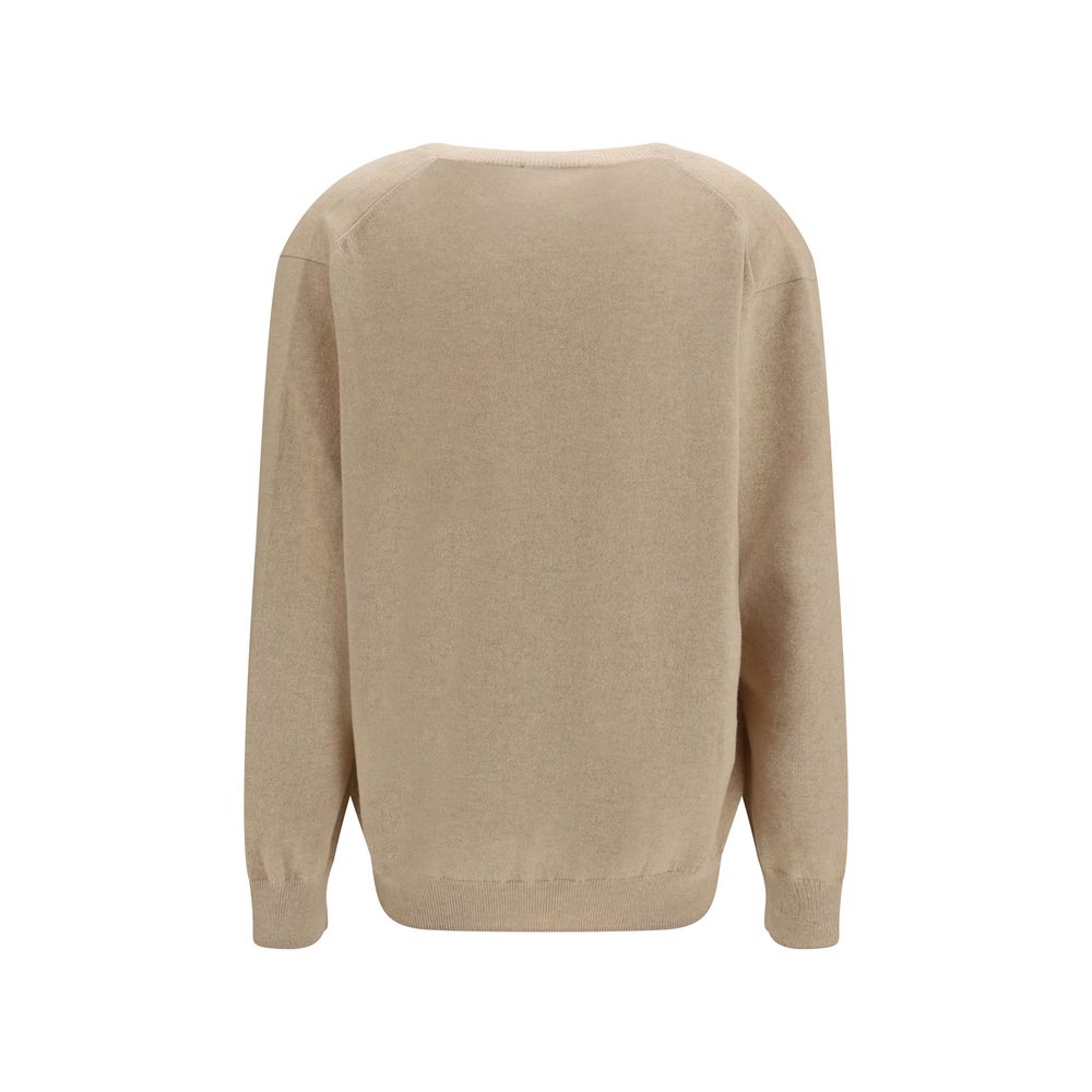 Indulge in the Malo Beige Cashmere Sweater, a masterpiece of 100% cashmere that embodies timeless elegance and sophistication for the discerning individual.