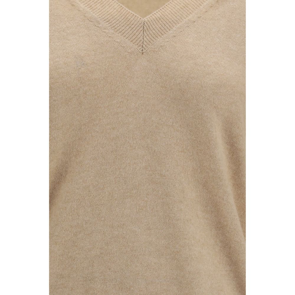 Indulge in the Malo Beige Cashmere Sweater, a masterpiece of 100% cashmere that embodies timeless elegance and sophisticated comfort for the discerning individual.