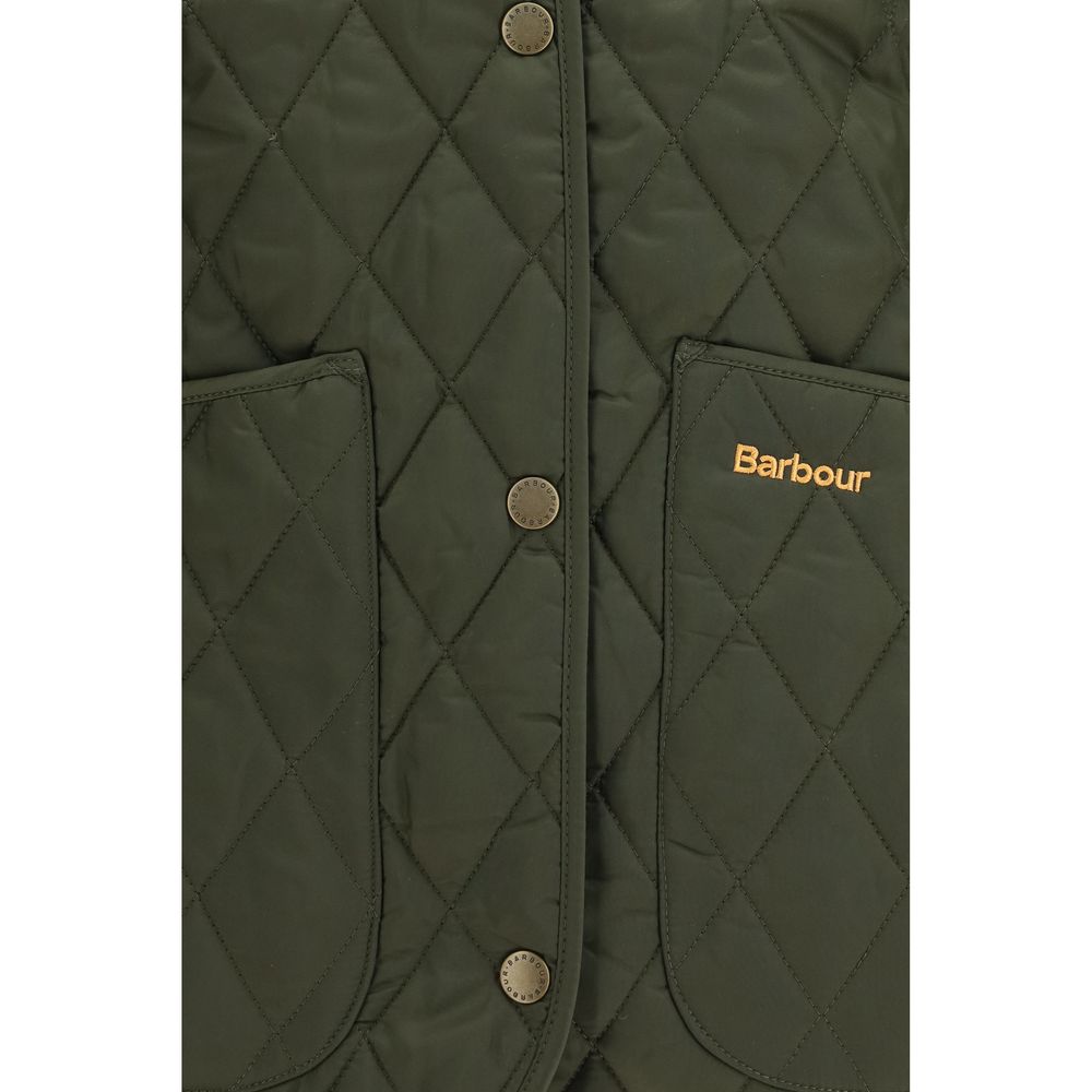 Discover the Barbour Bicolor Polyamide Shell Jacket, a fusion of iconic diamond quilting and timeless elegance, perfect for those who appreciate refined outdoor luxury.