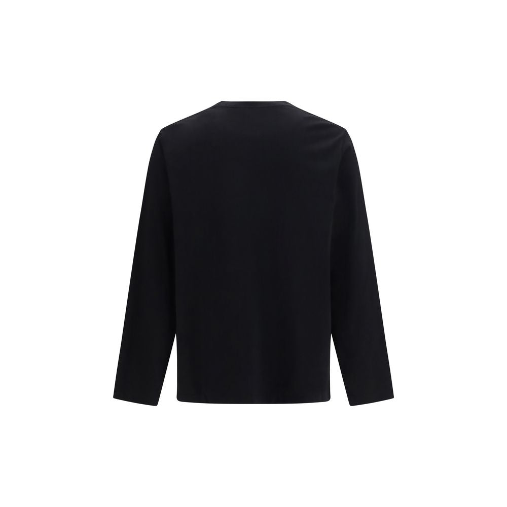 Indulge in the Canada Goose Black Cotton Long Sleeve T-Shirt, crafted from 100% organic cotton jersey, a timeless blend of luxury and comfort for the discerning individual.