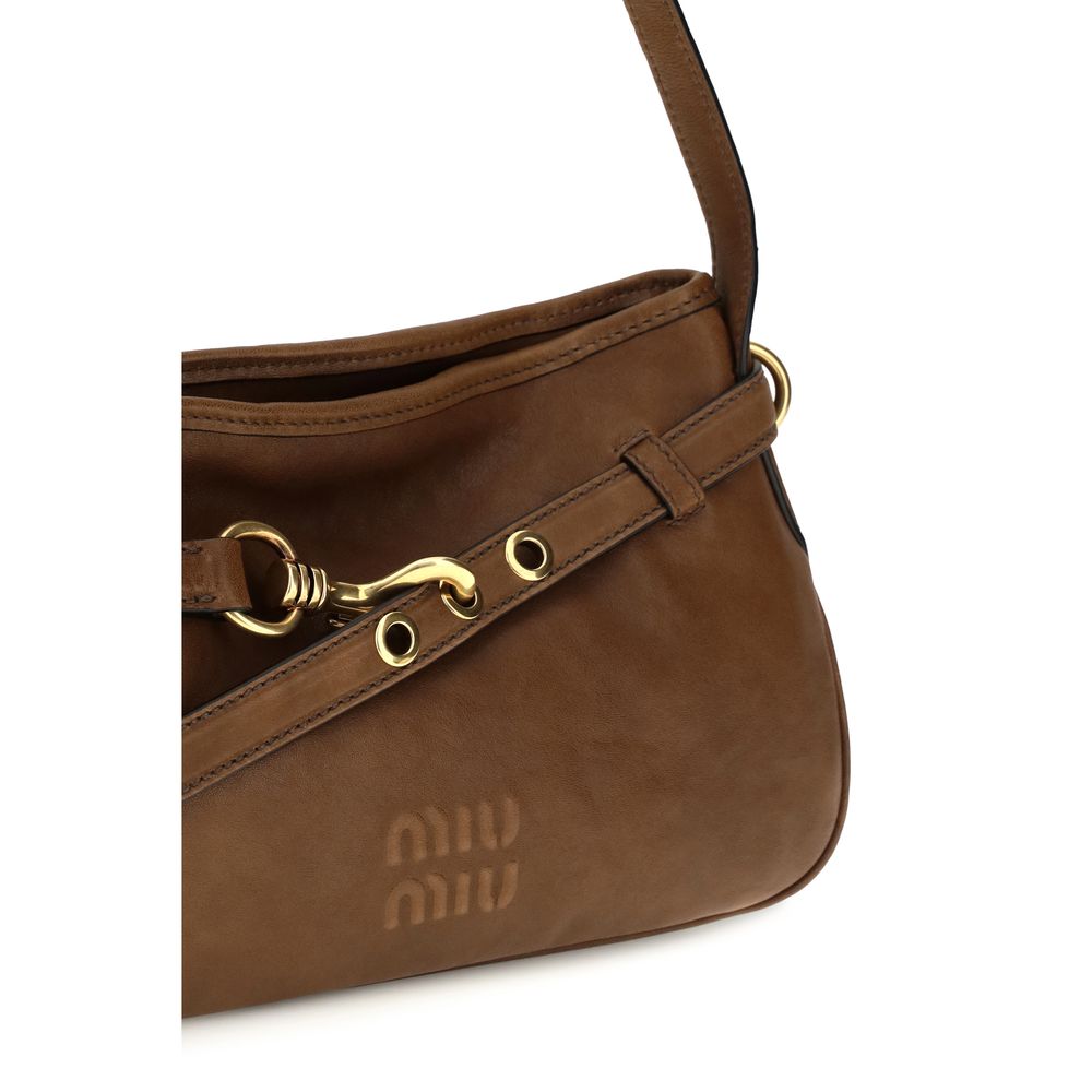 Experience the exquisite allure of the Miu Miu Brown Lamb Ovis Aries Aries Shoulder Bag, a masterpiece of haute couture craftsmanship that elevates your style with luxurious sophistication.