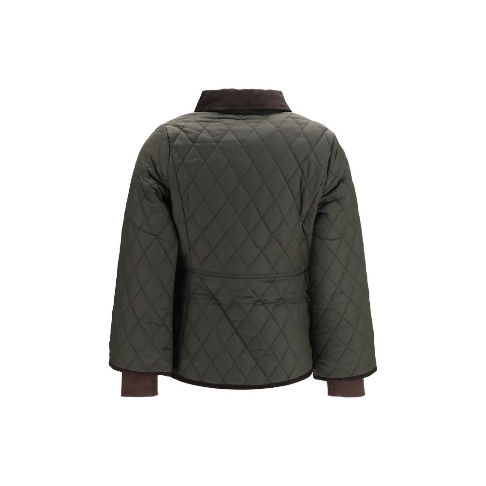 Elevate your outerwear collection with the Barbour Bicolor Polyamide Shell Jacket, a luxurious blend of style and functionality crafted for the discerning individual.