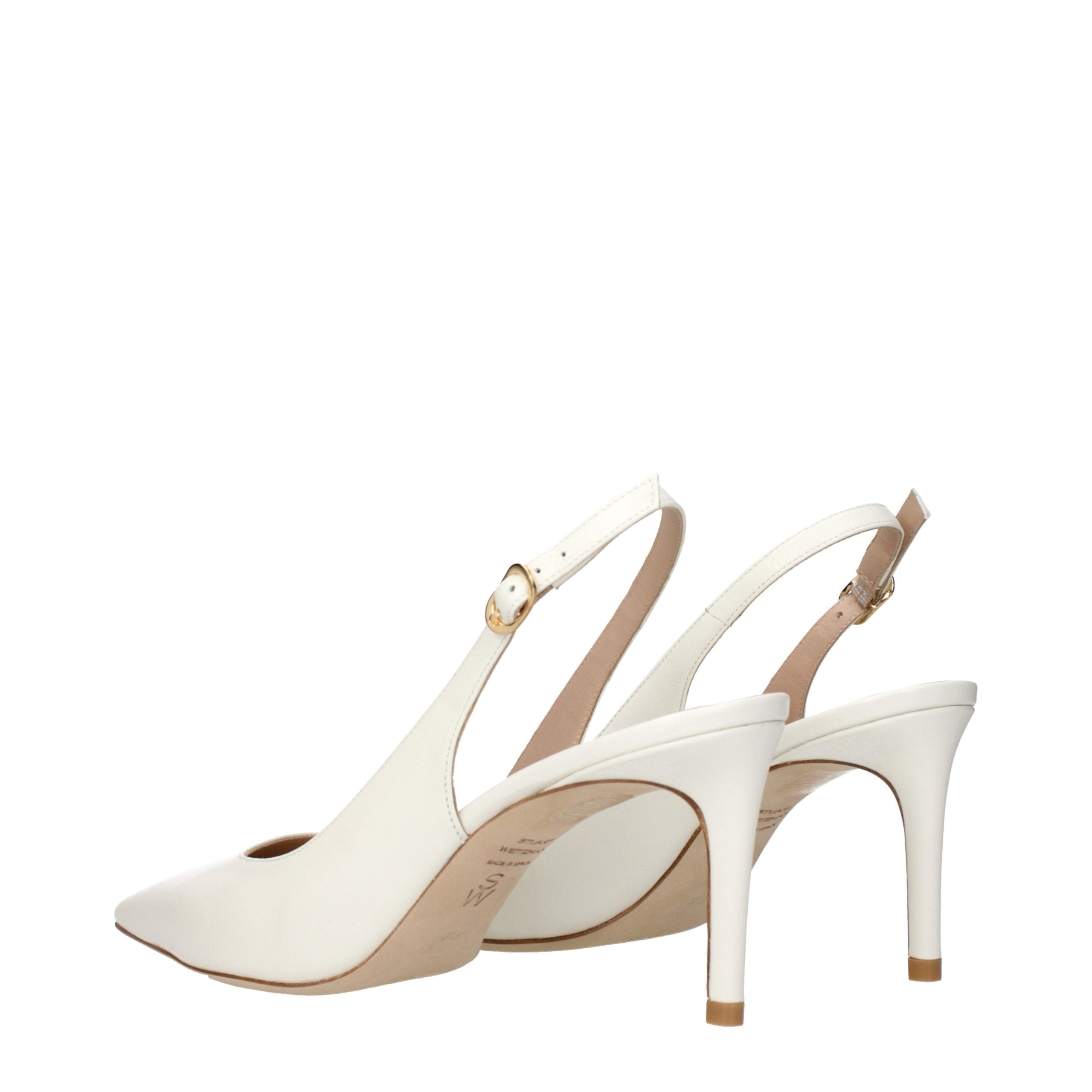 Step into a world of refined elegance with Stuart Weitzman Beige Leather High Heel Pumps, where exquisite craftsmanship meets timeless allure for the discerning individual.