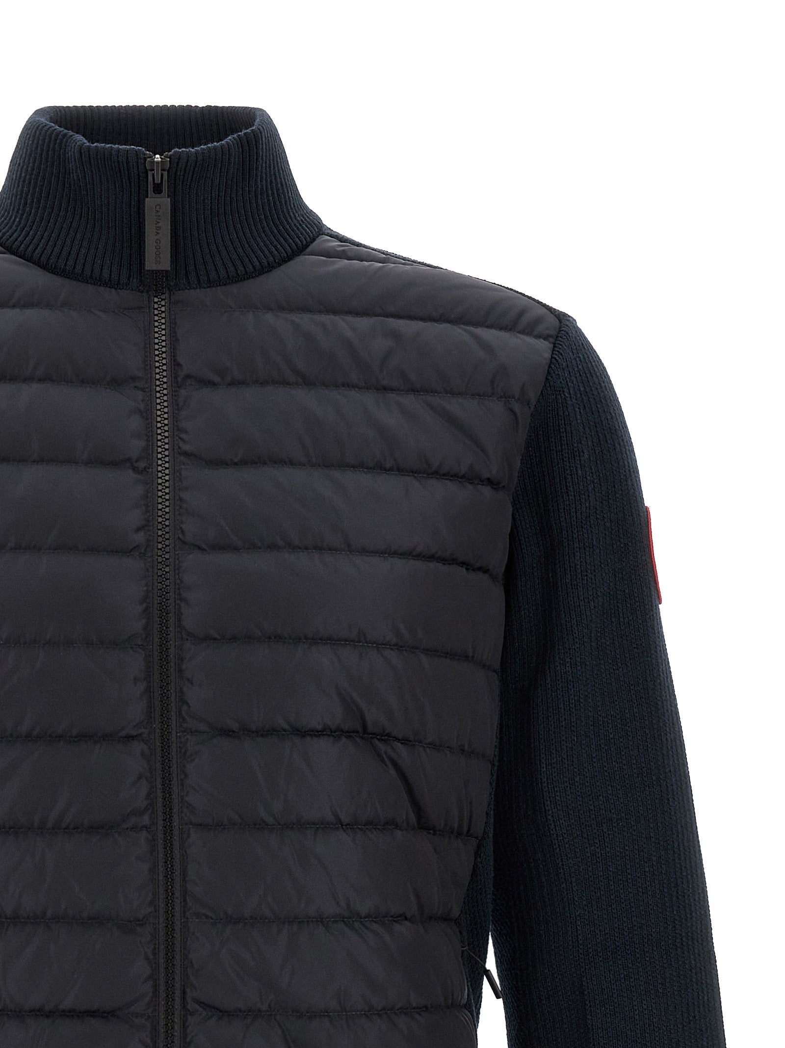 Experience the exquisite artistry of the Canada Goose Black Wool Full-Length Jacket, where technical innovation meets luxurious comfort, perfect for the discerning individual.