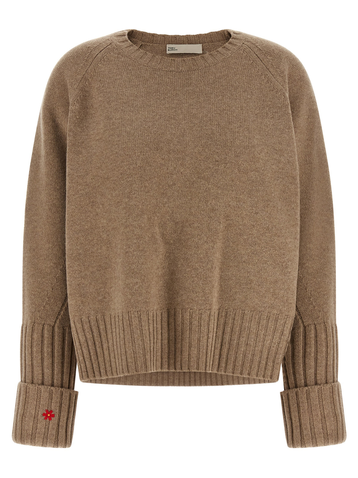 Elevate your wardrobe with the Tory Burch Beige Wool Cardigan, a masterpiece of artisanal craftsmanship and luxurious comfort, perfect for any sophisticated occasion.