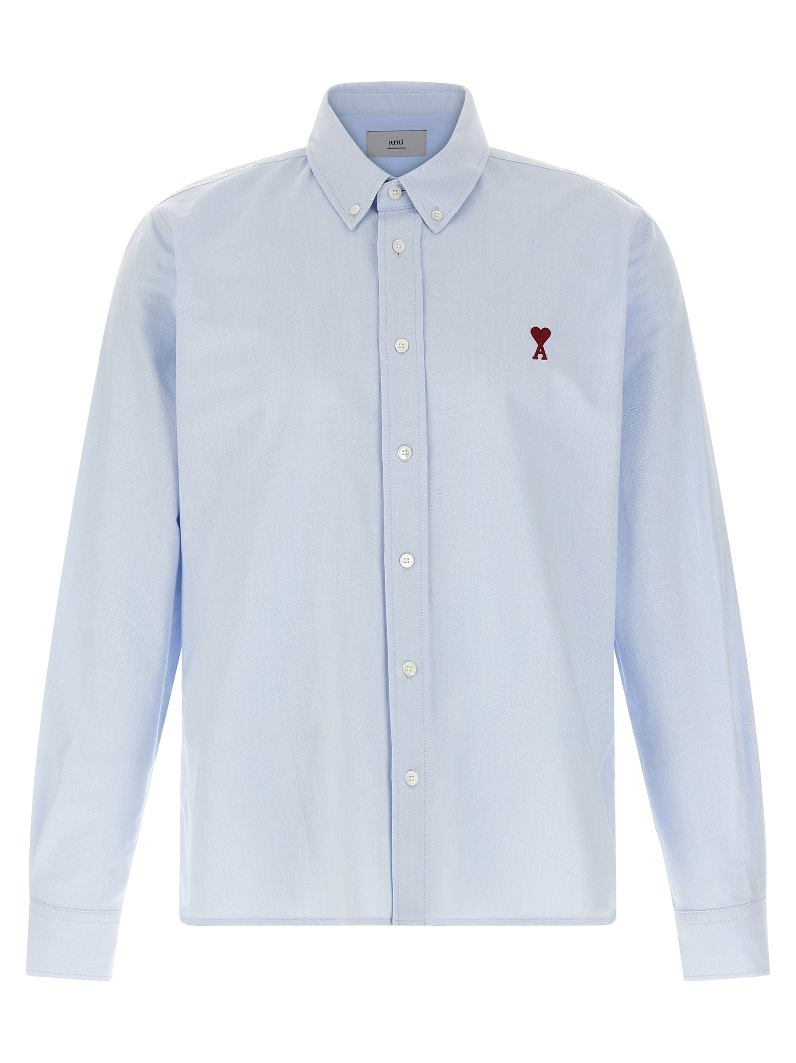 Discover the Ami Paris Blue Cotton Blouse, a masterpiece of Oxford cotton adorned with iconic embroidery, embodying timeless elegance and French sophistication.