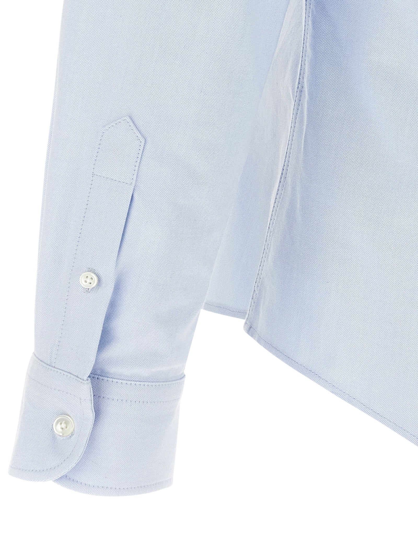 Elevate your style with the Ami Paris Blue Cotton Blouse, a masterpiece of French elegance crafted from premium Oxford cotton, embodying sophistication and allure.