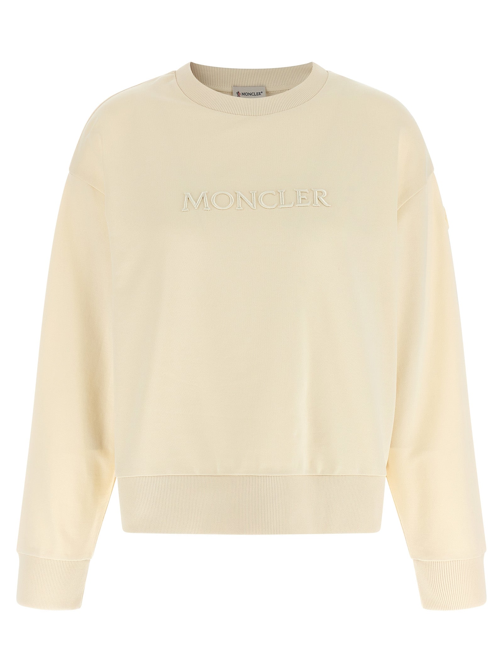 Indulge in the Moncler Beige Cotton Sweatshirt, a masterpiece of luxurious comfort and style, featuring exquisite craftsmanship and subtle elegance for the discerning individual.
