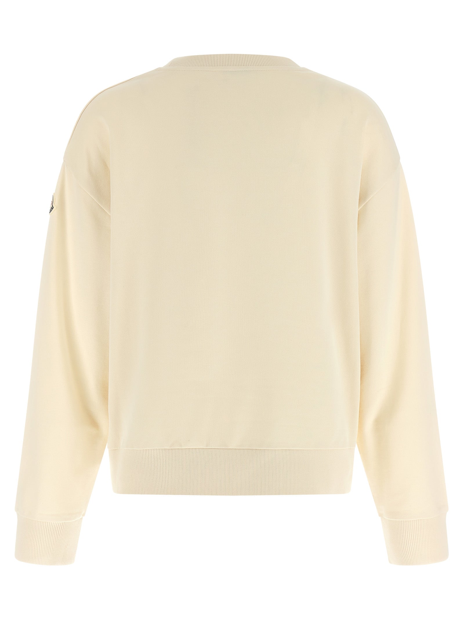 Indulge in the Moncler Beige Cotton Sweatshirt, a masterpiece of brushed cotton that exudes effortless elegance and comfort, perfect for the discerning wardrobe.