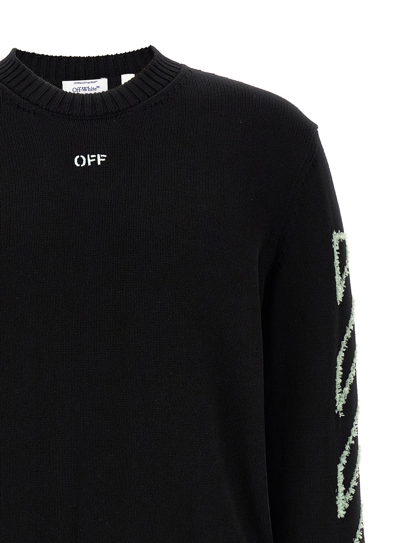 Indulge in the Off-White Black Cotton Cardigan, a masterpiece of Italian craftsmanship, merging luxury and comfort for a statement of effortless elegance.