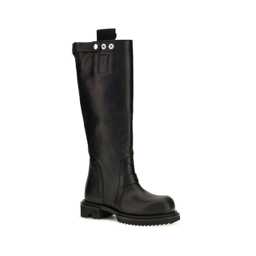 Elevate your style with Rick Owens Black Calf Leather Bos Taurus Rain Boots, crafted from exquisite vegetable-tanned leather for a timeless, avant-garde allure.