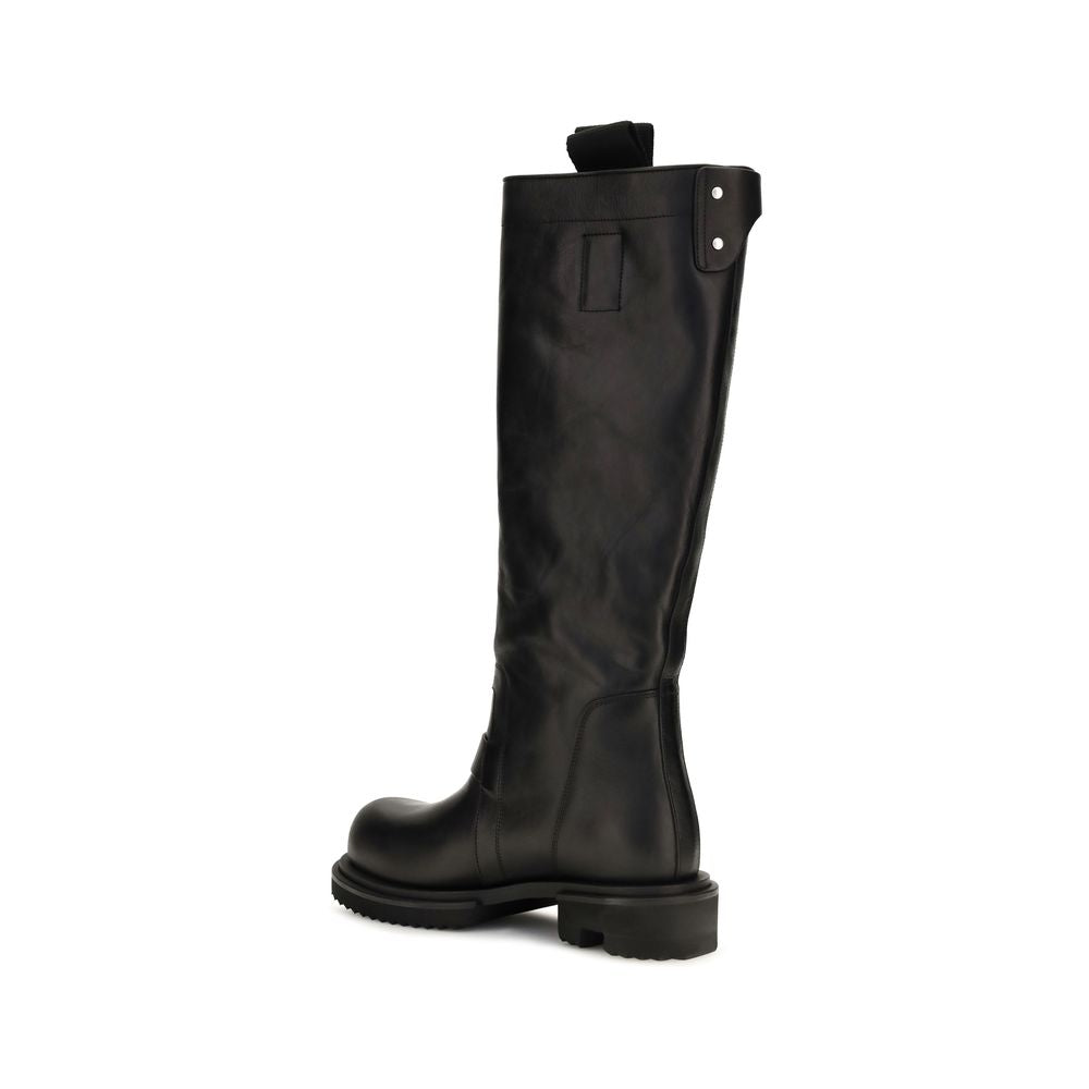 Elevate your style with Rick Owens Black Calf Leather Bos Taurus Rain Boots, crafted from exquisite vegetable-tanned leather for a timeless, avant-garde allure.