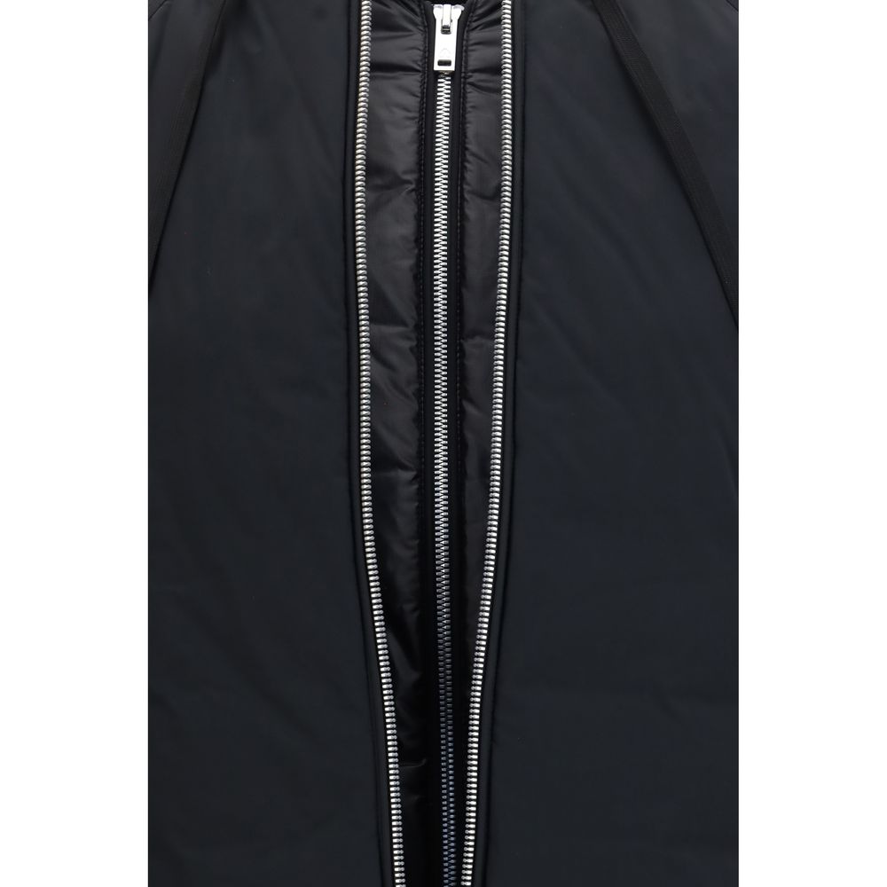 Indulge in the Tegan Bomber Down Jacket by Moose Knuckles, crafted from recycled ripstop nylon with luxurious down insulation, embodying elegance and sophistication for discerning tastes.