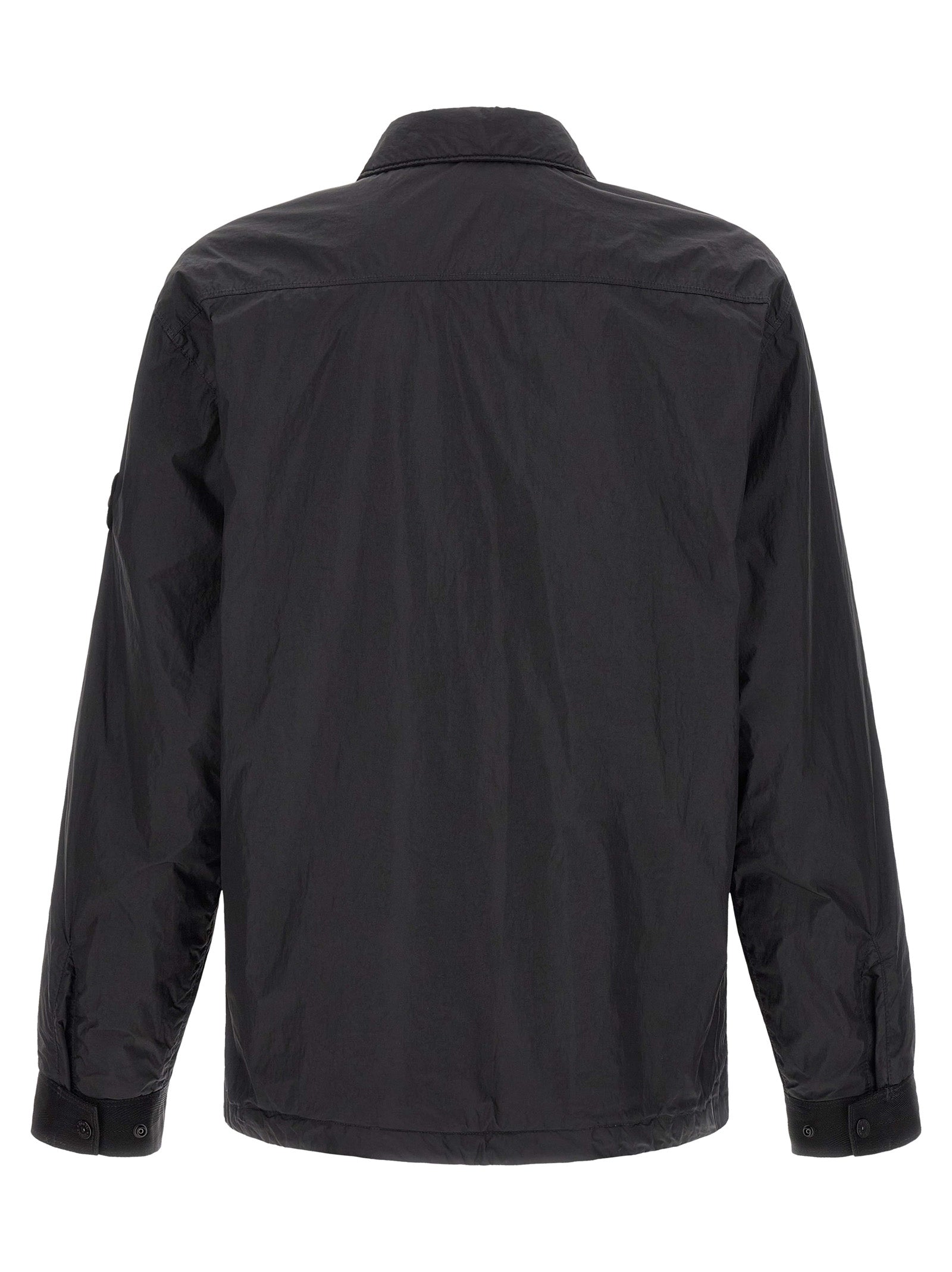 Discover the Stone Island Black Polyamide Shell Jacket, a masterful blend of craftsmanship and style, perfect for those who command elegance and sophistication.