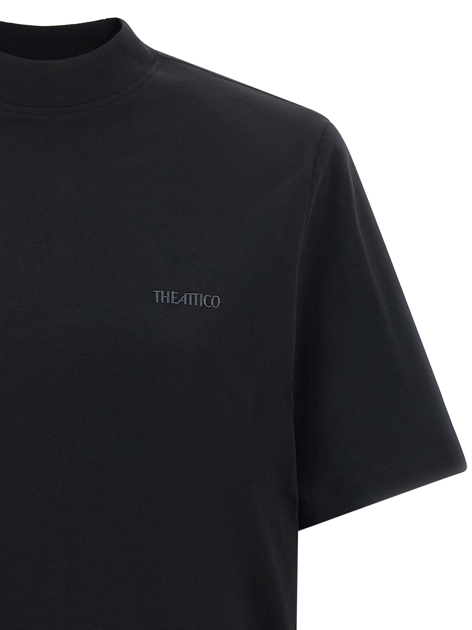 Discover the elegance of THE ATTICO Black Cotton T-Shirt, a luxurious blend of comfort and sophistication, perfect for those who appreciate refined style and artisanal craftsmanship.
