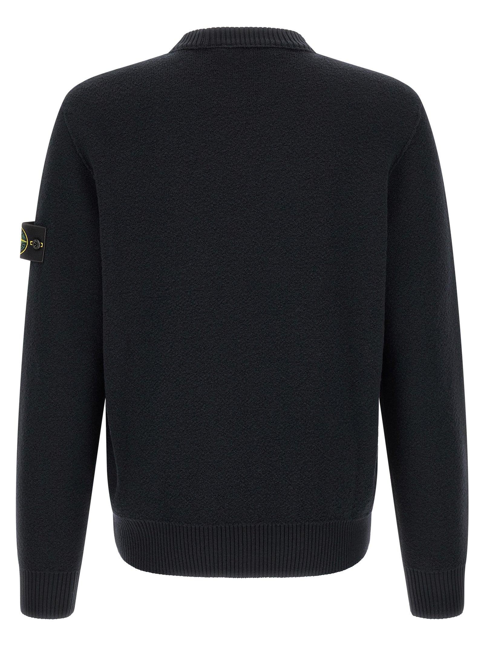 Elevate your winter wardrobe with the Stone Island Blue Virgin Wool Cardigan, a masterpiece of craftsmanship and style, embodying luxury and sophistication.