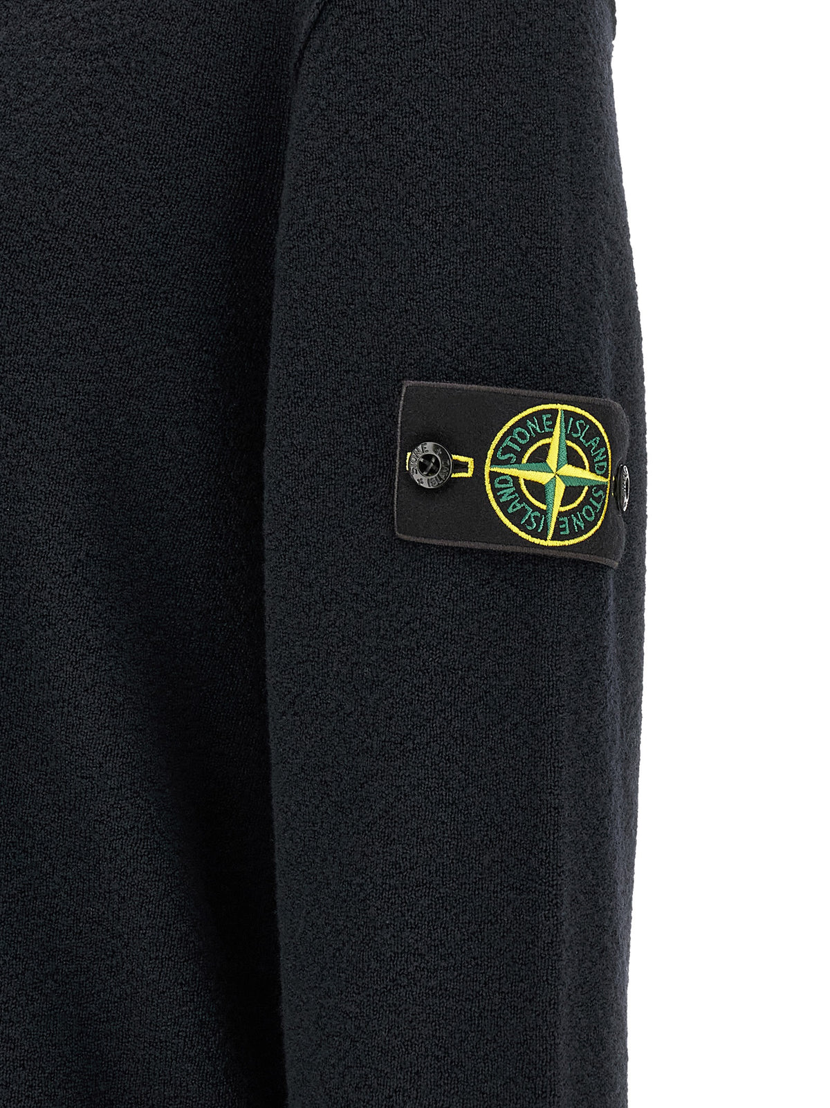 Elevate your wardrobe with the Stone Island Blue Virgin Wool Cardigan, a luxurious blend of artisanal craftsmanship and timeless elegance, perfect for any discerning individual.