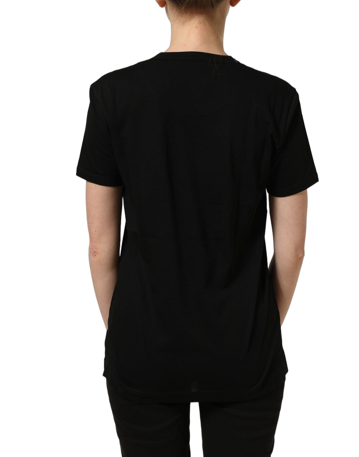 Elevate your wardrobe with the Dolce & Gabbana Black Cotton Crew Neck T-shirt, a masterpiece of Italian craftsmanship that embodies timeless elegance and luxurious comfort.