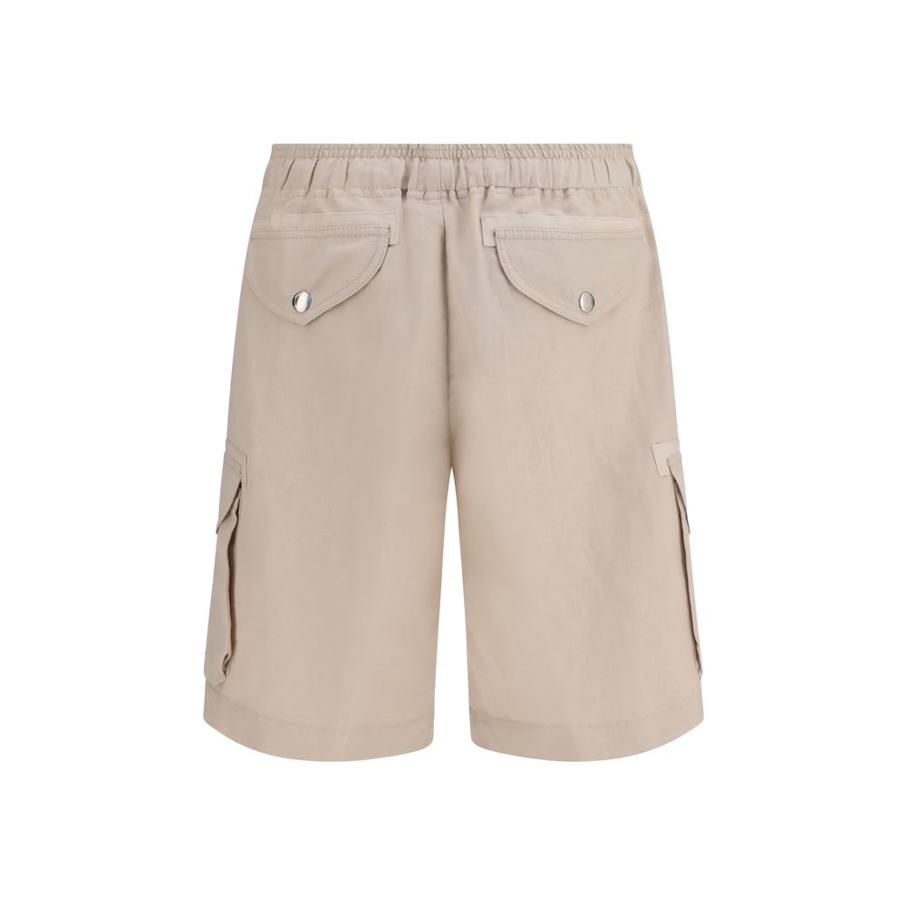 Experience the epitome of luxury with Brunello Cucinelli Beige Linen Bermuda Shorts, crafted from a premium linen-cotton blend for effortless elegance and comfort.