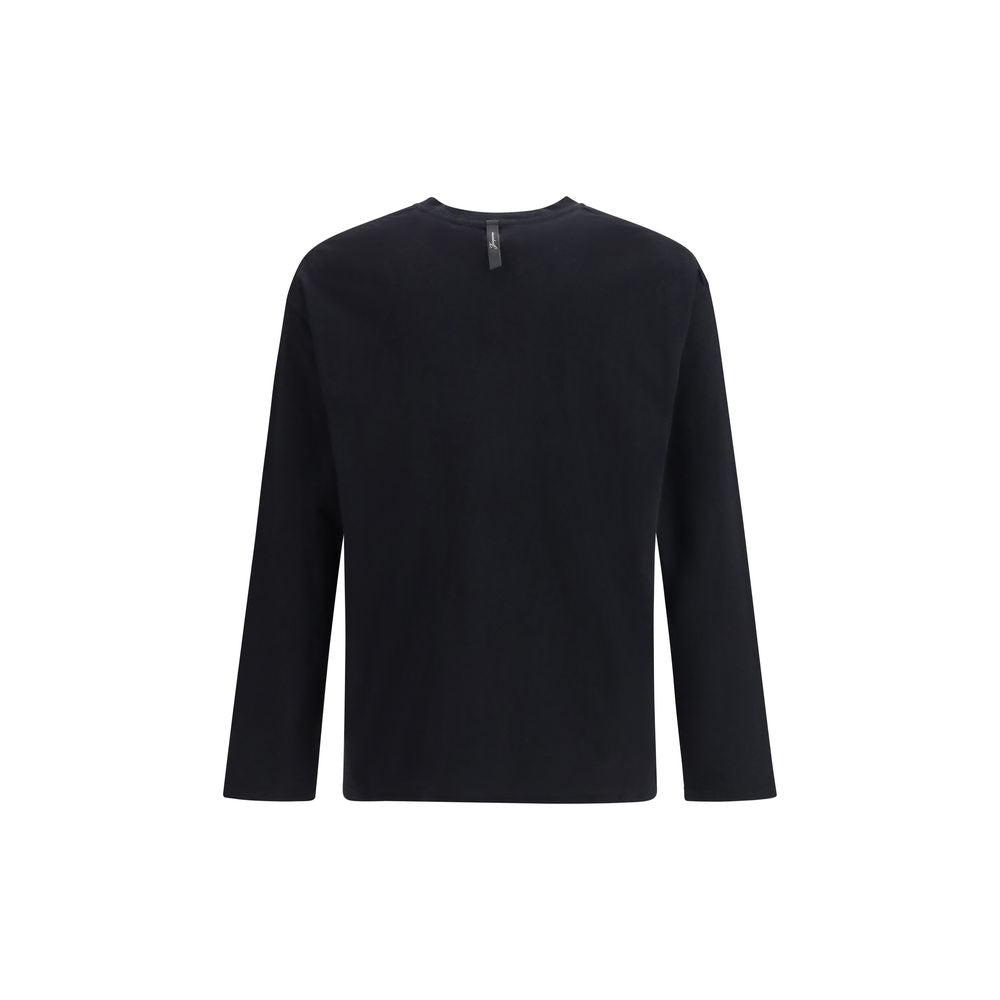 Indulge in the Jacquemus Black Cotton Sportswear T-Shirt, a luxurious blend of cotton and hemp, embodying sophistication and sustainable elegance for the discerning wardrobe.