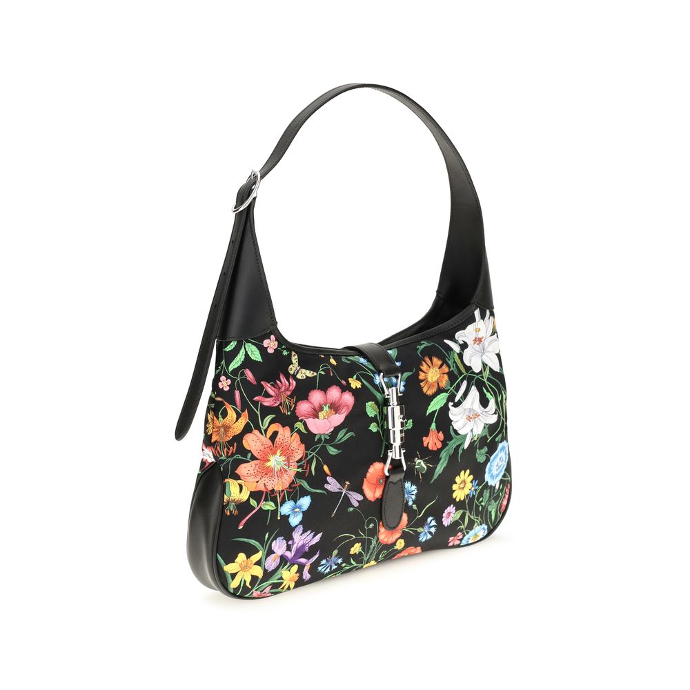 Elevate your style with the Gucci Multicolor Nylon Handbag from the Jackie 1961 collection, a masterpiece of luxurious craftsmanship and timeless elegance.