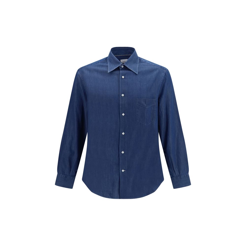 Discover the Brunello Cucinelli Blue Denim Shirt, a masterpiece of 100% cotton elegance, blending luxurious craftsmanship with versatile style for the discerning individual.