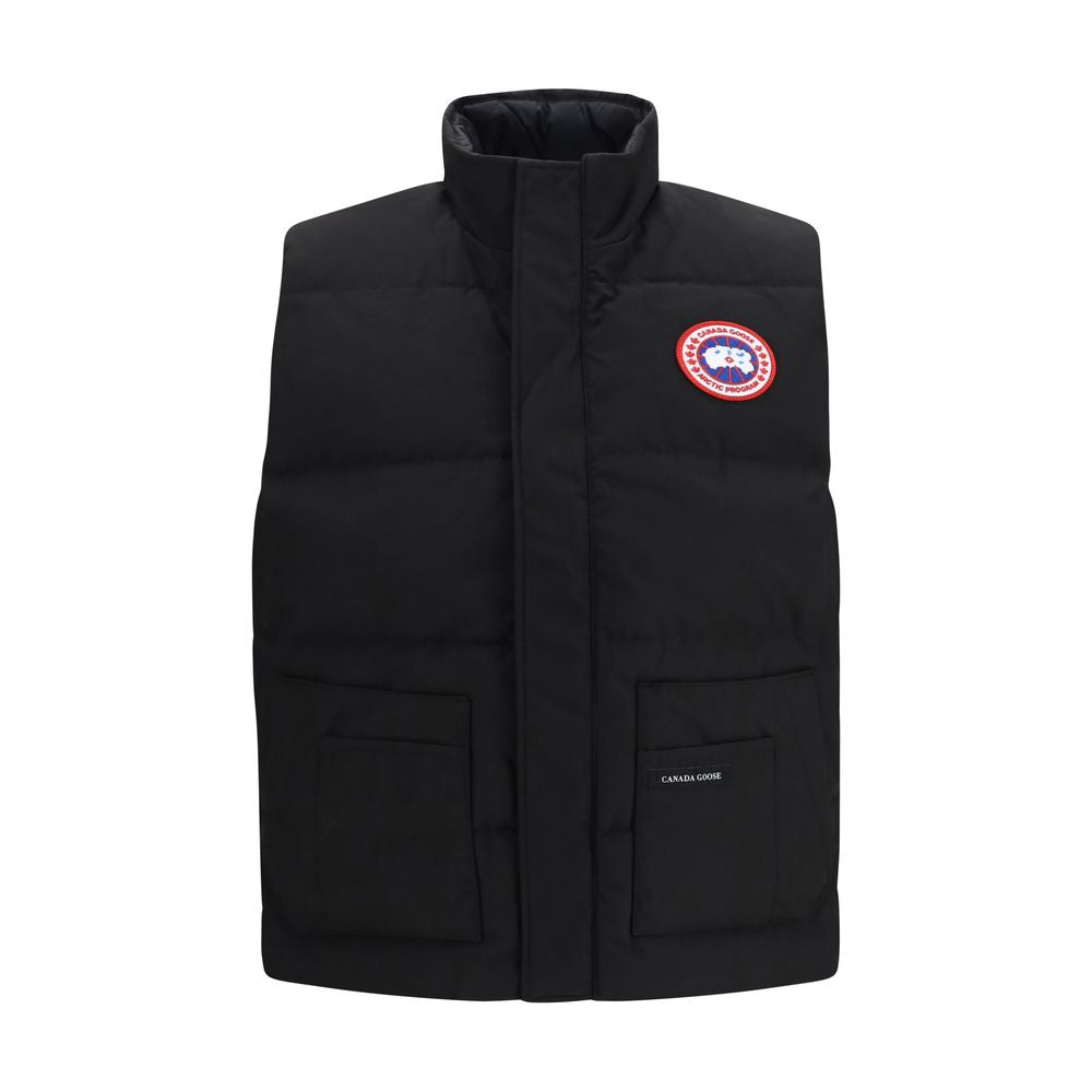 Elevate your style with the Canada Goose Black Recycled Polyester Sleeveless Jacket, a masterpiece of sustainable luxury, designed for the discerning individual.