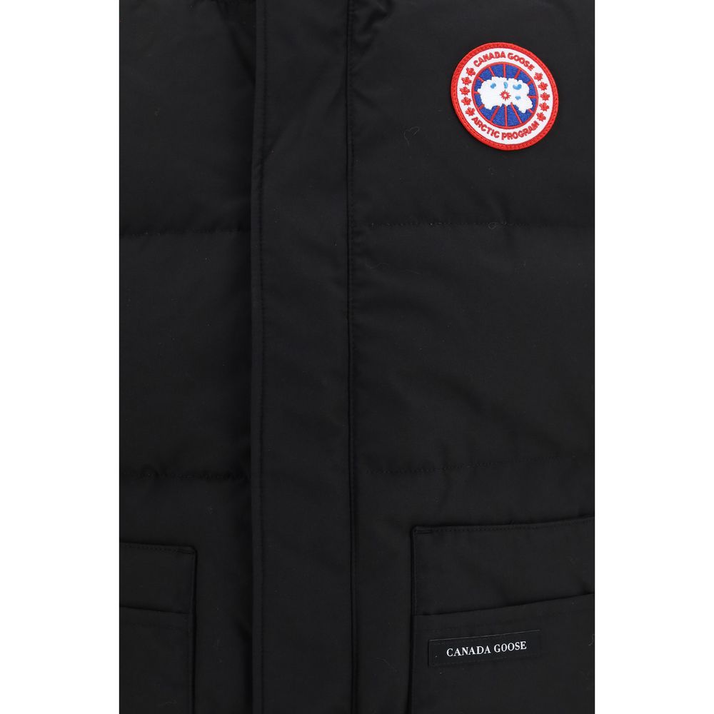 Elevate your style with the Canada Goose Black Recycled Polyester Sleeveless Jacket, a blend of sustainable luxury and timeless design, perfect for the discerning individual.
