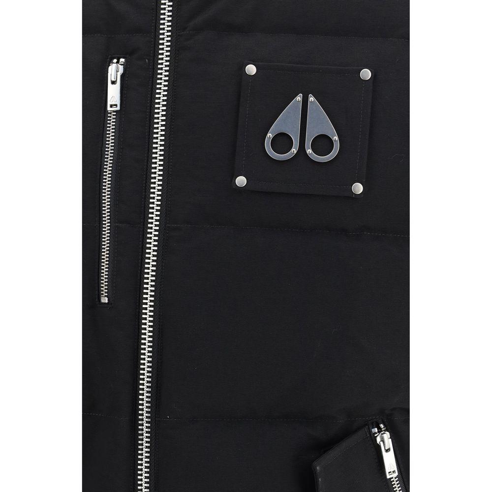Elevate your style with the Moose Knuckles Black Cotton Sleeveless Jacket, a masterpiece of comfort and protection, designed for the discerning individual.