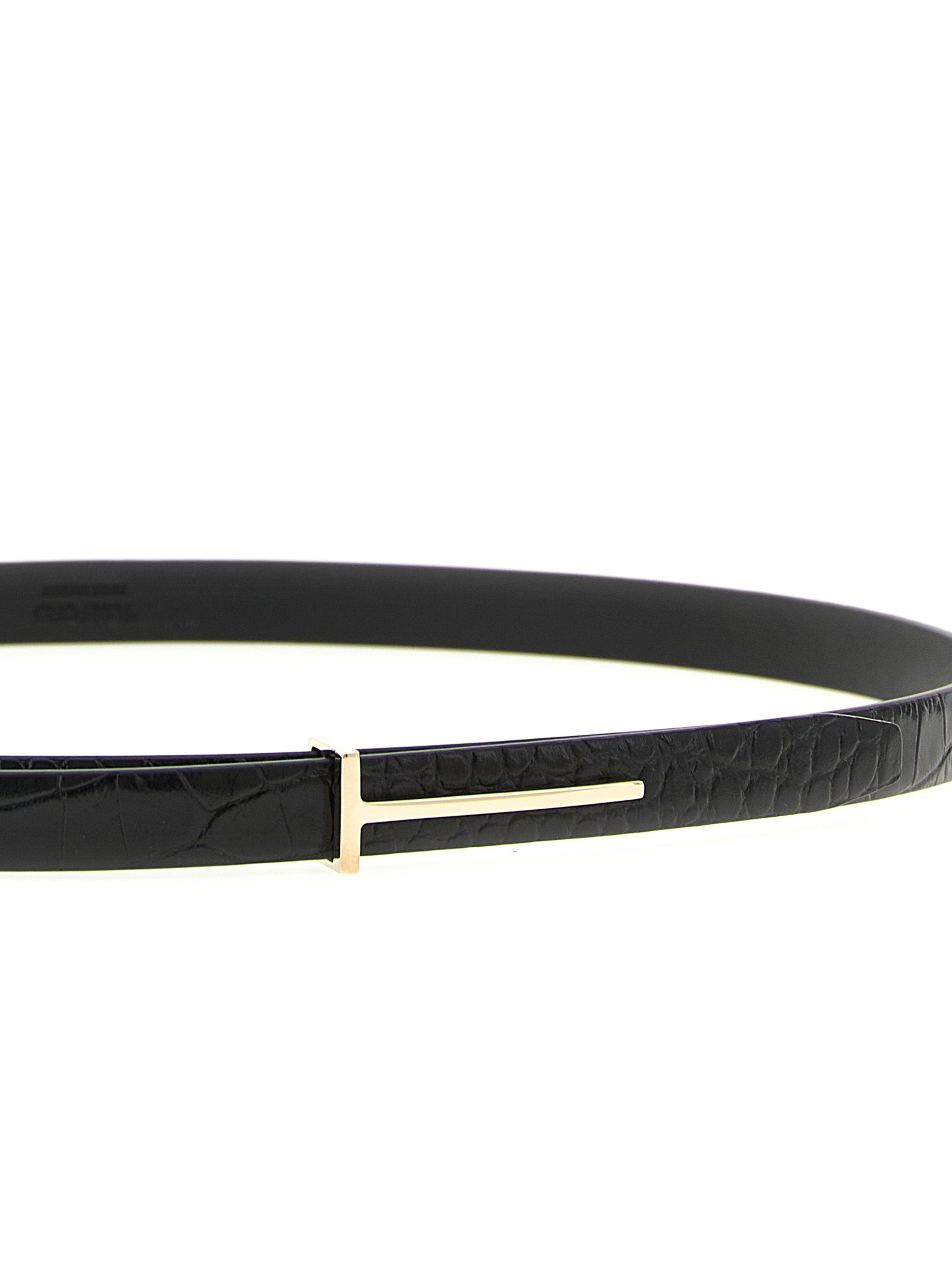 Discover the Tom Ford Black Calfskin Regular Belt, a symbol of Italian craftsmanship and luxury, featuring a glossy crocodile print and refined metallic buckle for timeless elegance.