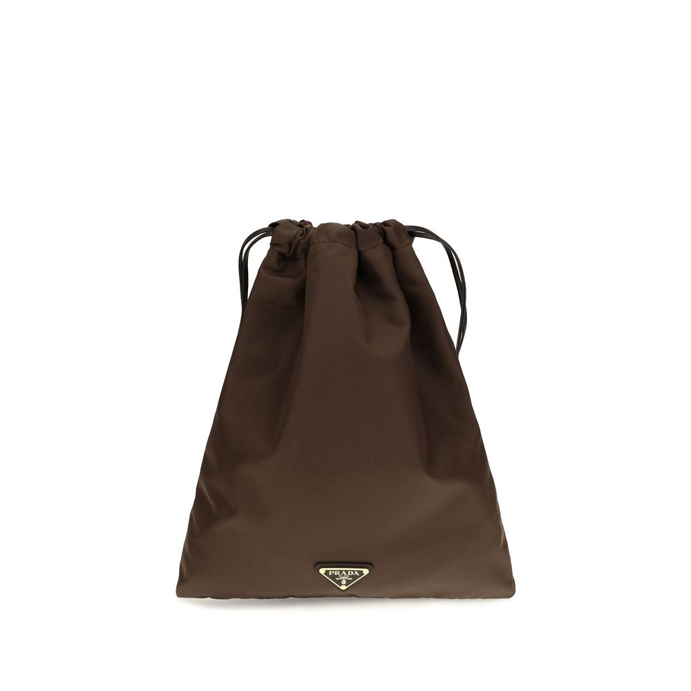 Indulge in the Prada Brown Polyamide Clutch Bag, a masterpiece of eco-luxury crafted from Re-Nylon. Elevate your style with sustainable sophistication and timeless elegance.