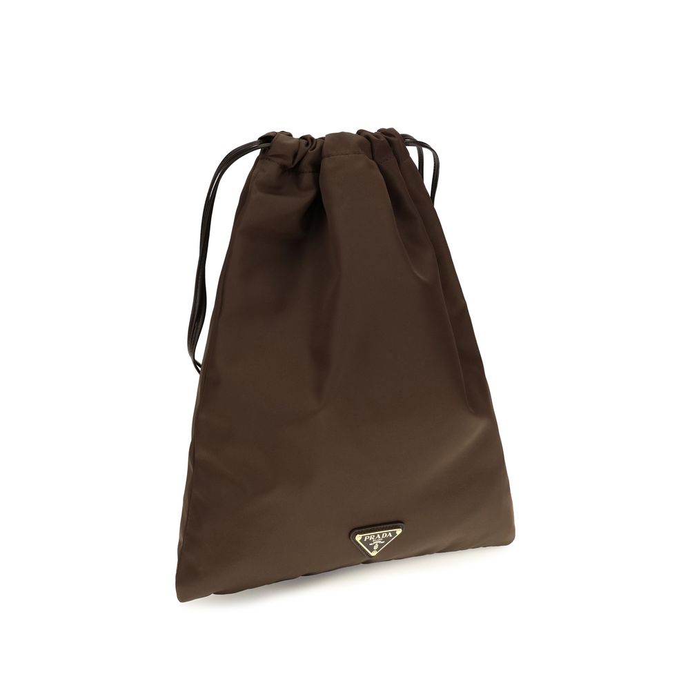 Discover the Prada Brown Polyamide Clutch Bag, a fusion of sustainability and elegance crafted from recycled ocean plastics, perfect for elevating any ensemble.