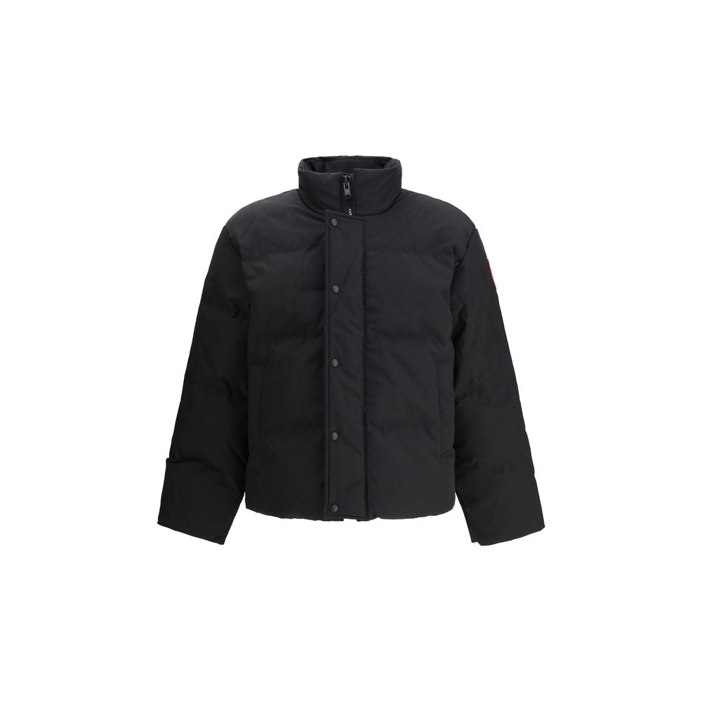 Discover the Canada Goose Black Polyester Parka, a blend of exquisite craftsmanship and water-repellent luxury, perfect for the discerning individual seeking timeless elegance.