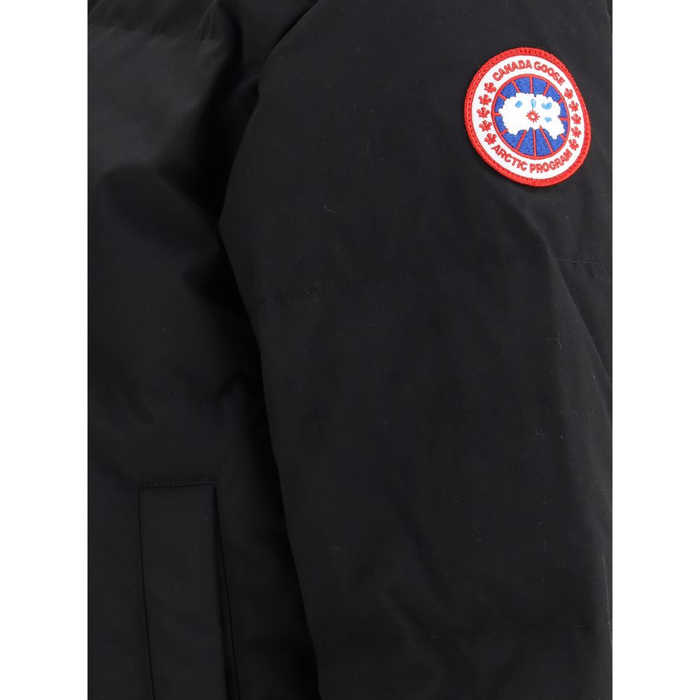 Discover the Canada Goose Black Polyester Parka, a fusion of exquisite craftsmanship and timeless elegance, designed for the discerning individual seeking unparalleled style and functionality.