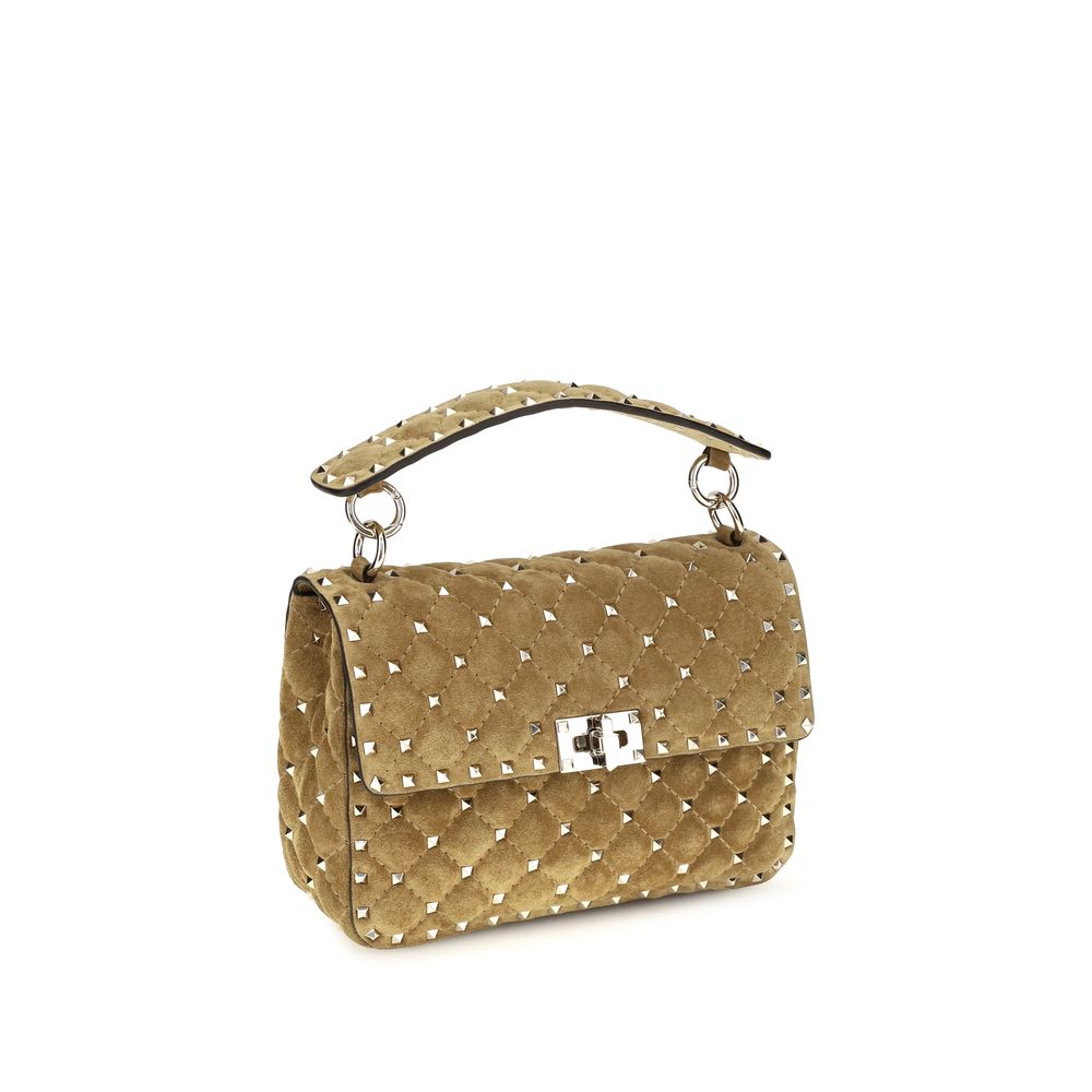 Elevate your style with the Valentino Garavani Beige Calf Leather Bos Taurus Shoulder Bag, a masterpiece of Italian craftsmanship that embodies timeless elegance and sophistication.