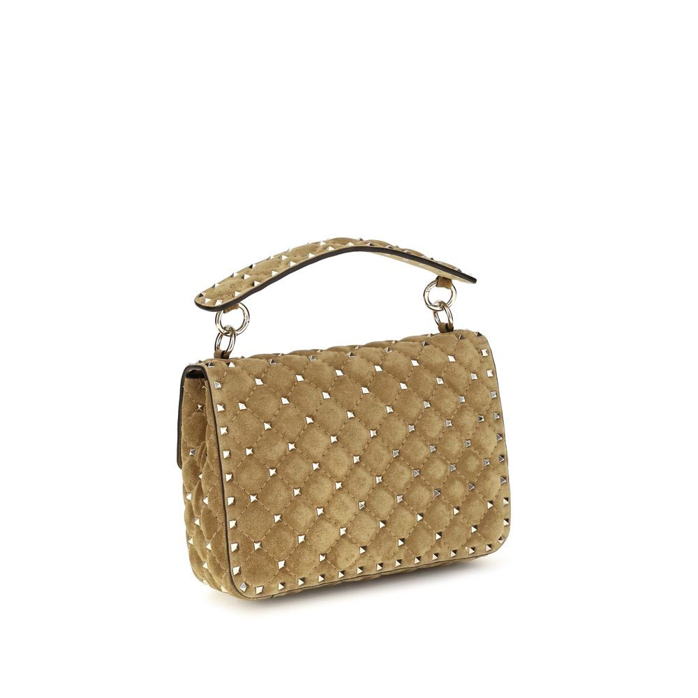 Indulge in the elegance of the Valentino Garavani Beige Calf Leather Bos Taurus Shoulder Bag, a masterpiece of Italian craftsmanship, perfect for elevating any ensemble.