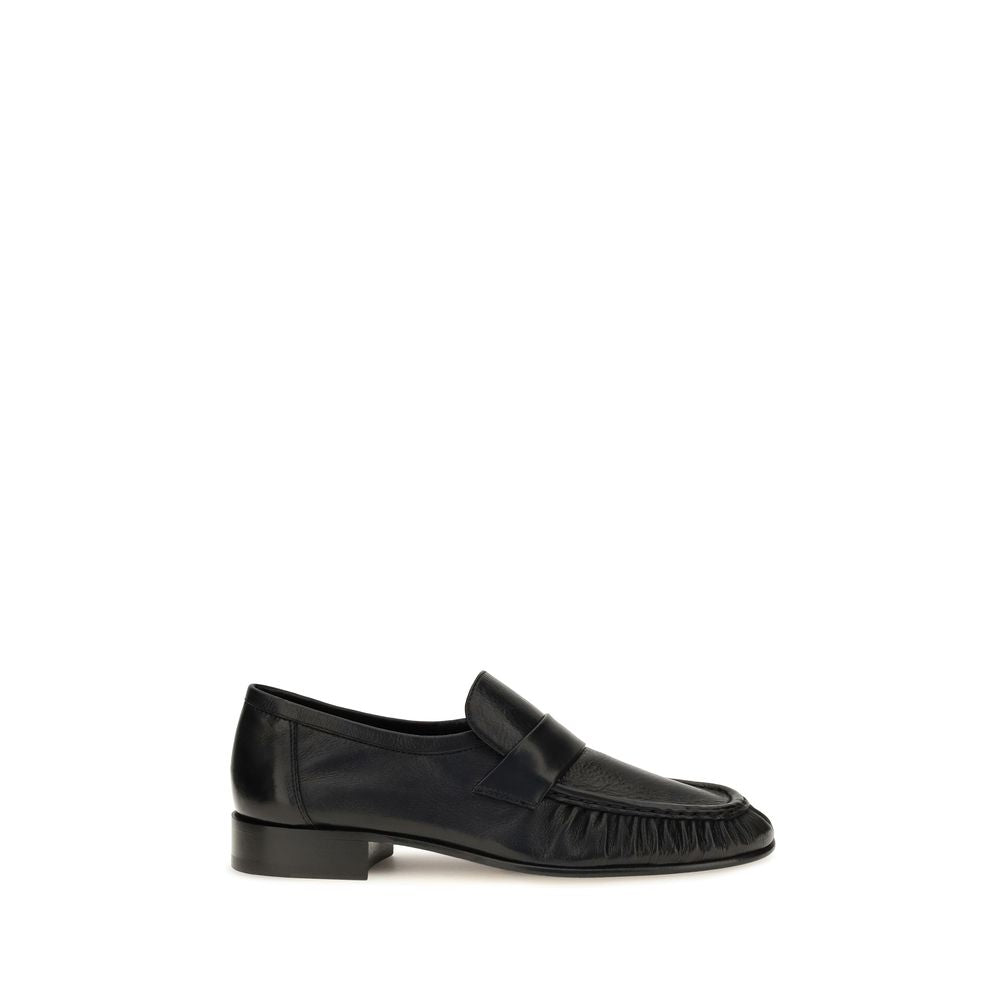 The Row Black Calf Leather Bos Taurus Slip-On Loafers - Luxury Redefined