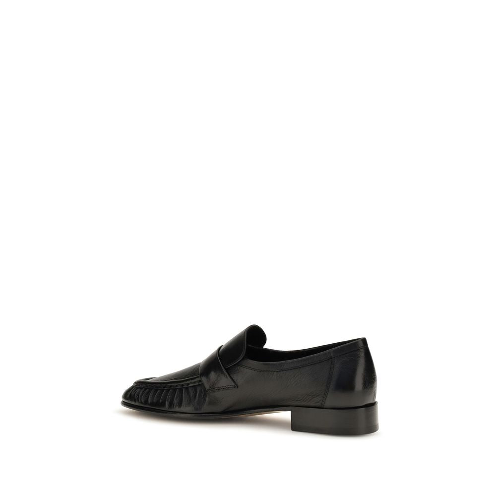 The Row Black Calf Leather Bos Taurus Slip-On Loafers - Luxury Redefined