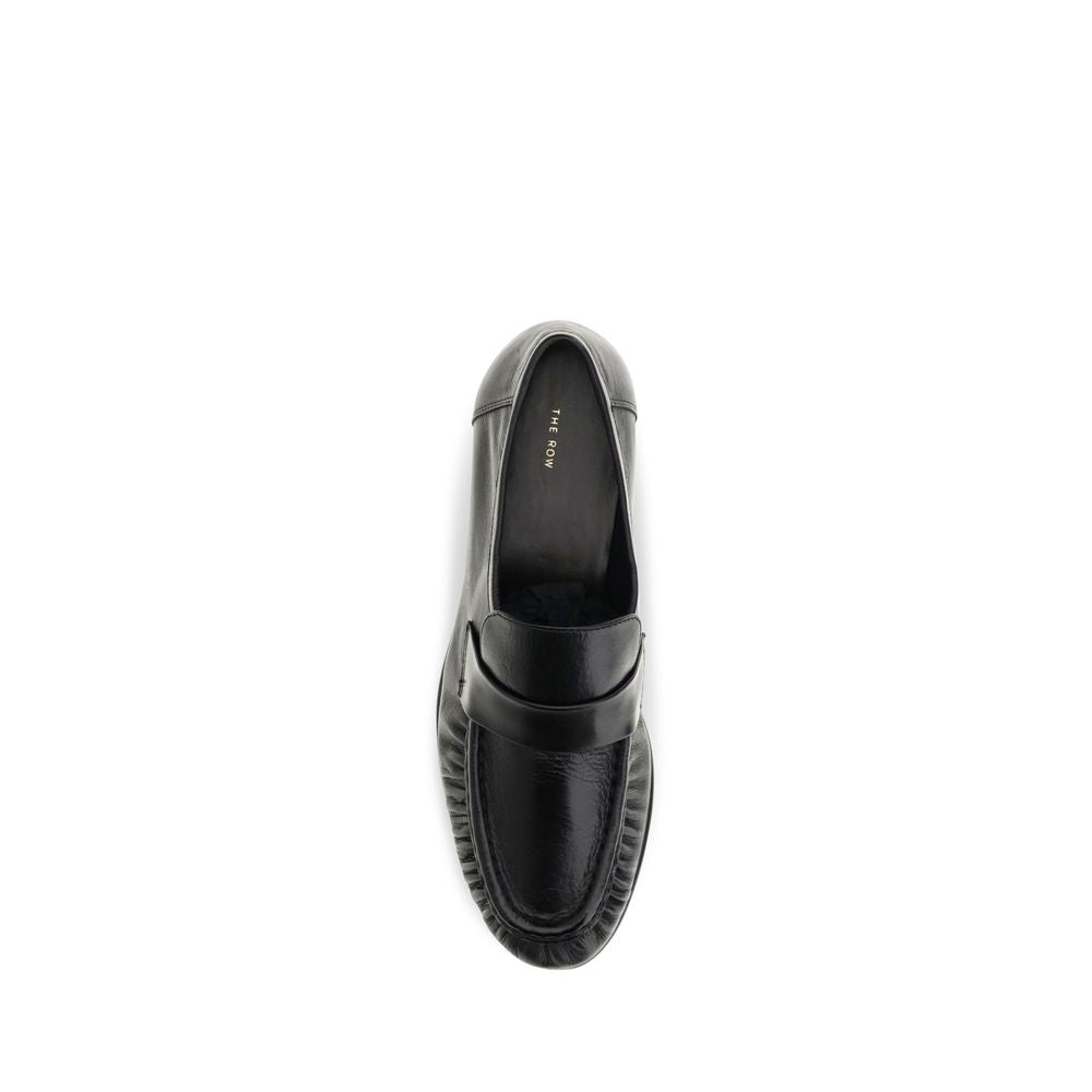 The Row Black Calf Leather Bos Taurus Slip-On Loafers - Luxury Redefined