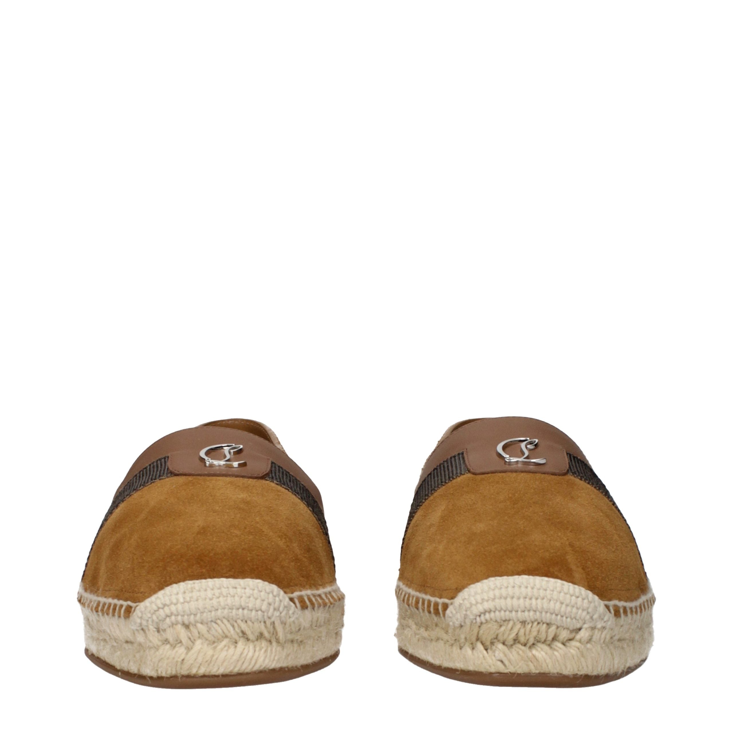 Discover the allure of Christian Louboutin Brown Leather Espadrilles, where exquisite suede craftsmanship meets timeless elegance, perfect for any sophisticated occasion.