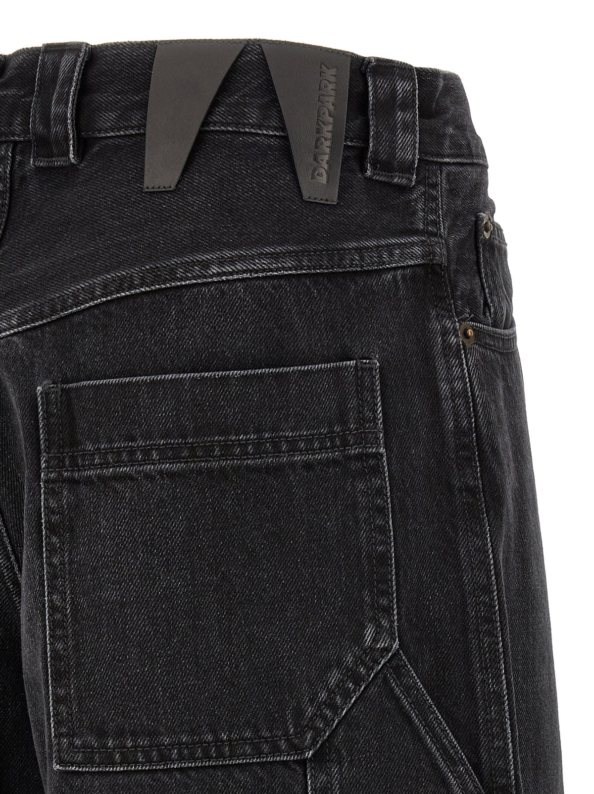 Indulge in the audacious elegance of DARKPARK's Black Cotton Relaxed Fit Jeans, where sculptural volume meets contemporary utility for a bold statement in luxury fashion.