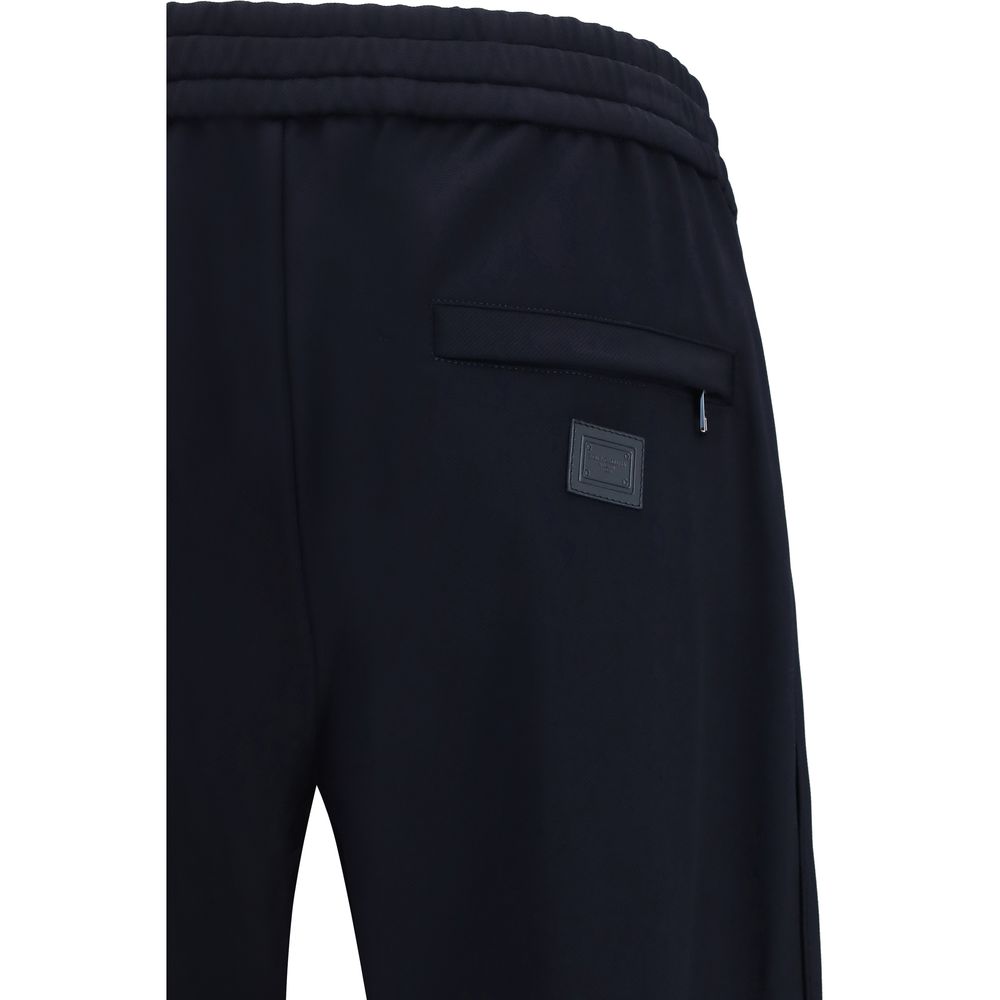 Experience the allure of Dolce & Gabbana Blue Polyamide Athletic Pants, where expert craftsmanship meets luxurious comfort, perfect for the discerning individual.
