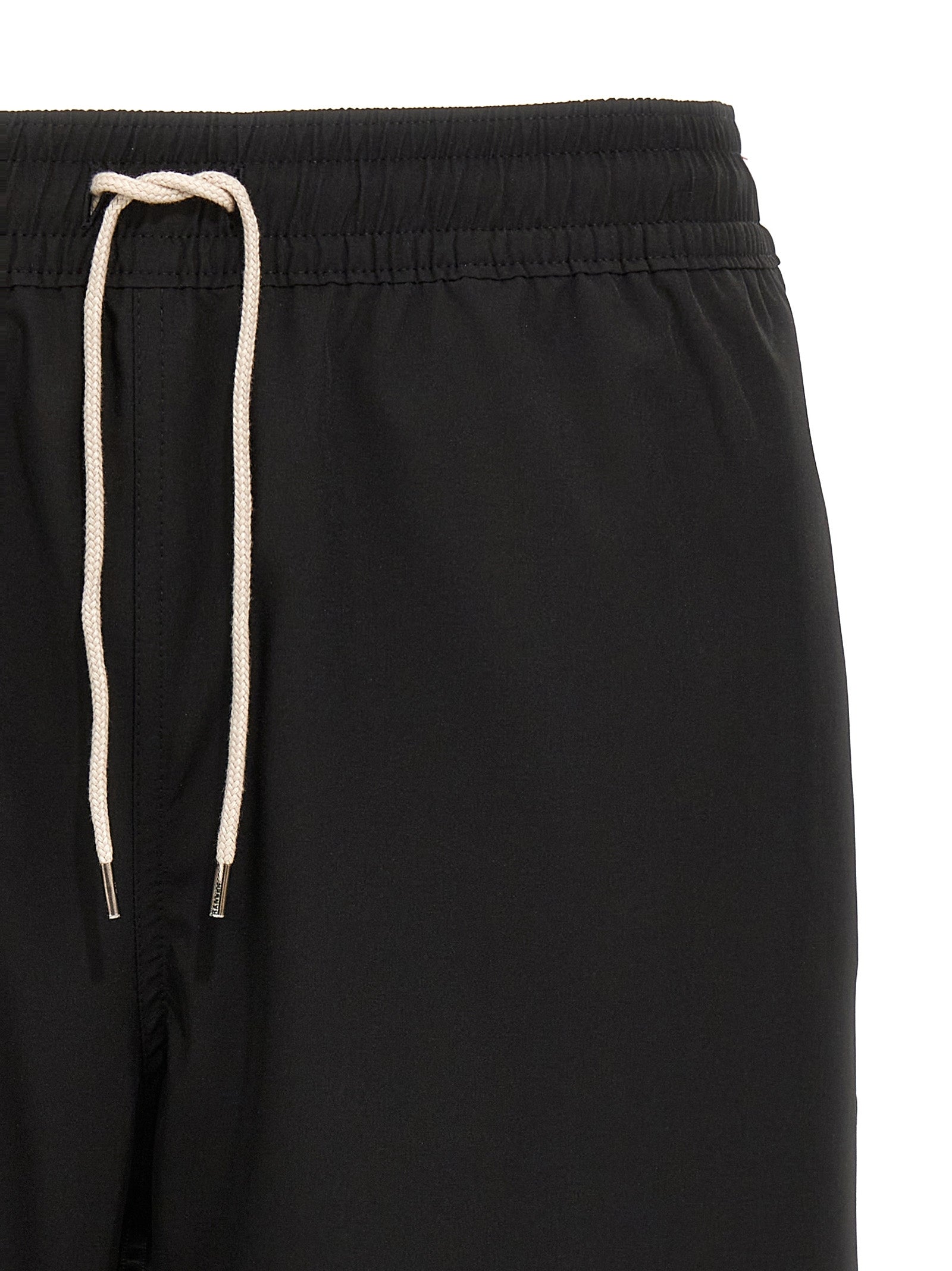 Elevate your summer style with Polo Ralph Lauren's luxurious black swim shorts, crafted from a premium blend of polyester and elastane for unmatched comfort and sophistication.