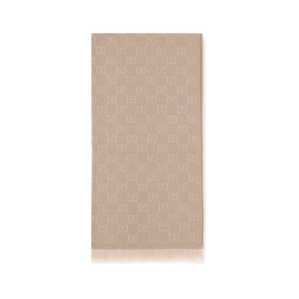 Experience the exquisite allure of the Gucci Beige Wool Oves Aries Foulard, crafted from 100% Wool Ovis Aries, embodying timeless luxury and sophisticated artistry.