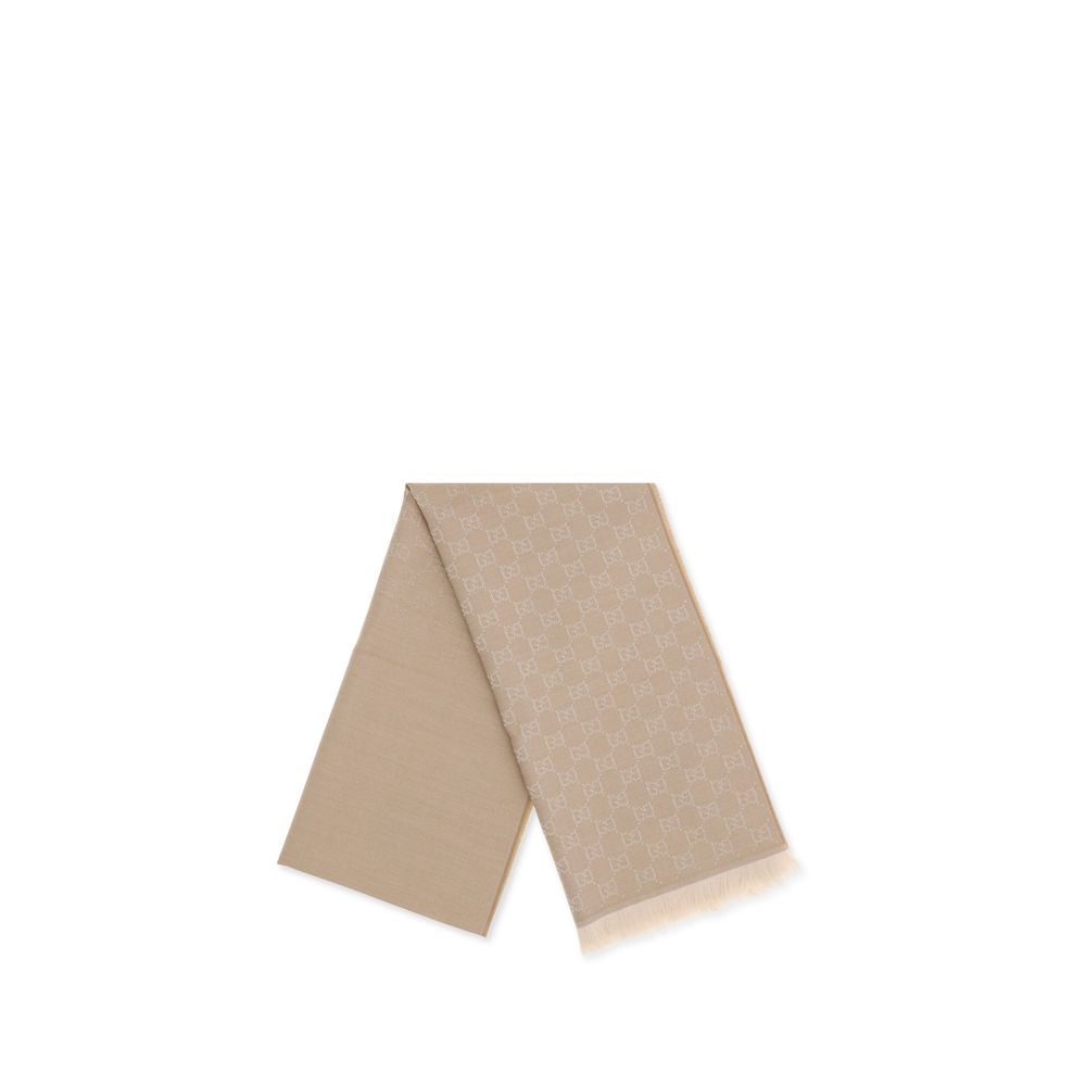 Elevate your style with the Gucci Beige Wool Oves Aries Foulard, a luxurious 100% wool masterpiece that embodies sophistication and timeless elegance.
