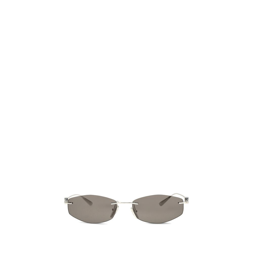 Indulge in the Balenciaga Silver Metal Sunglasses from the AW26 collection, where bold geometric elegance meets luxurious craftsmanship, elevating your style effortlessly.