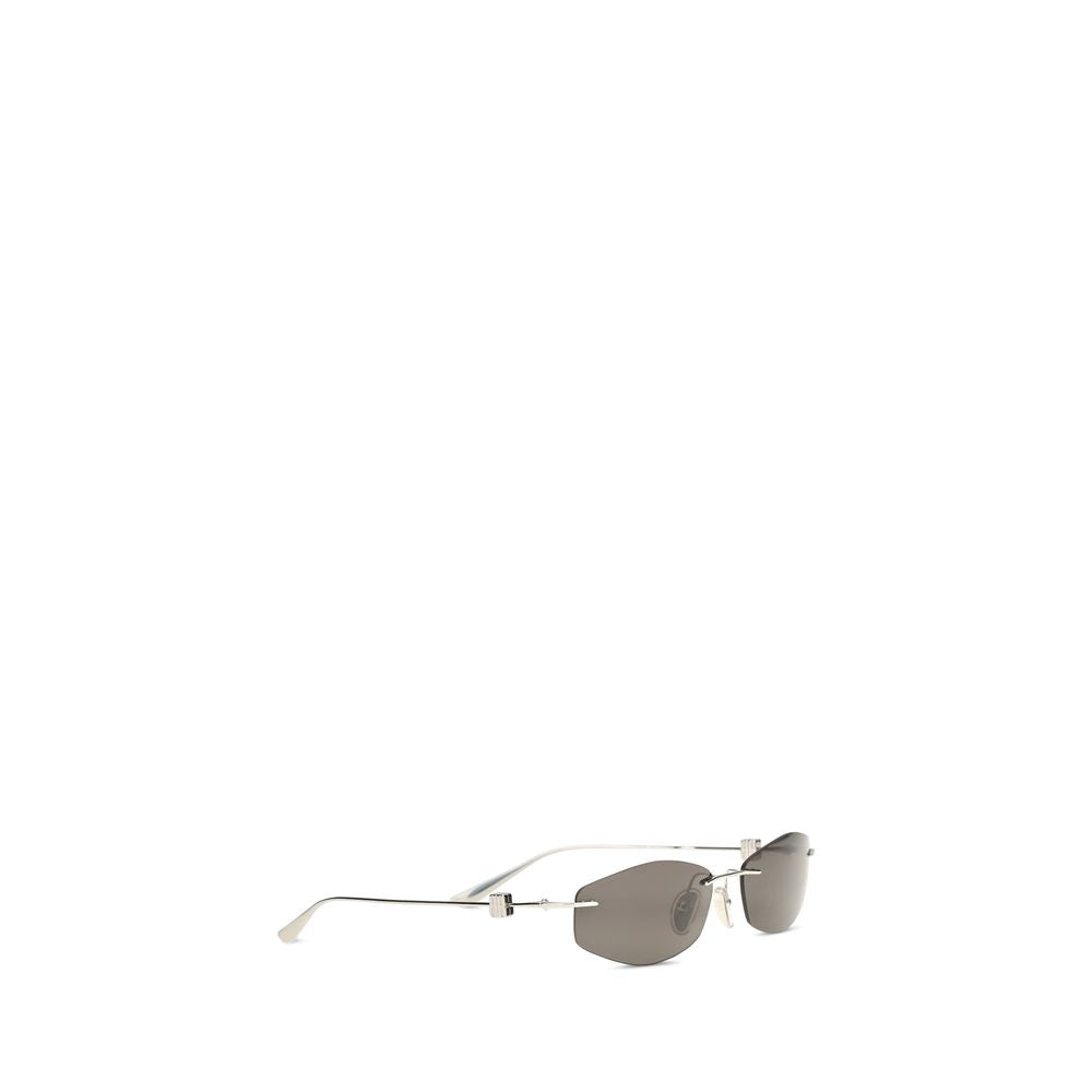 Elevate your style with Balenciaga Silver Metal Sunglasses from the AW26 collection, where bold design meets refined elegance, perfect for the discerning connoisseur.
